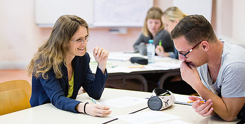 Professor and student in conversation