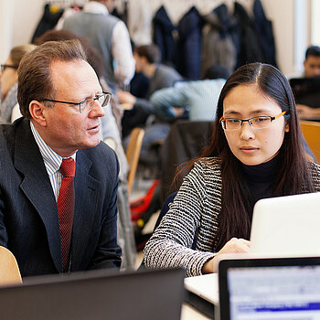 Professor and student in conversation